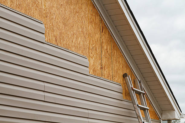 Professional Emergency Siding Repair technician working in Creedmoor, NC